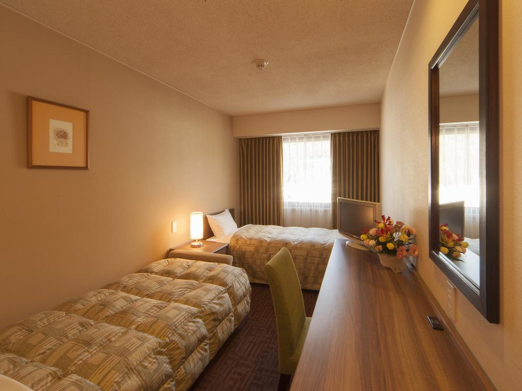 Hotel Pearl City Kesennuma Habitación foto